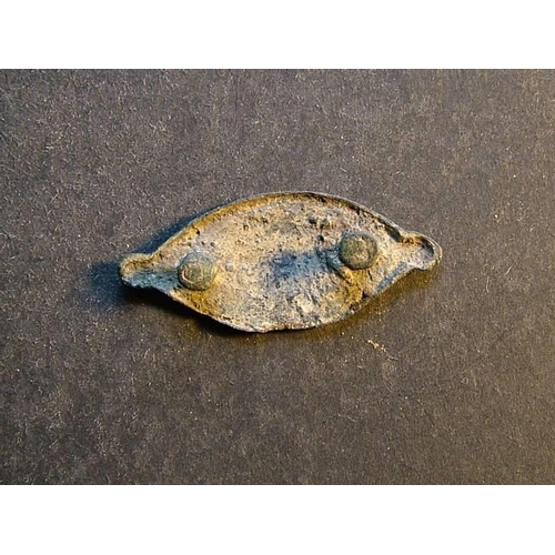 494 - Romano-British.  Small cast bronze stud or harness mount in the form of an eye.  Outer ring of dark ... 