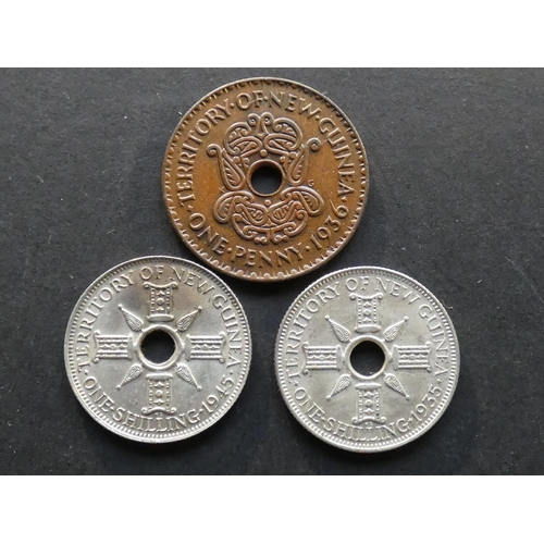 395 - NEW GUINEA.  Penny, 1936, Edward VIII, and Shilling, 1935 & 1945, GVF to EF  (3)