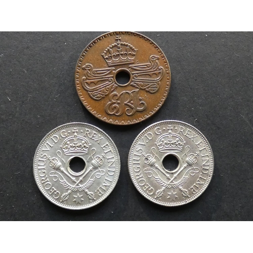 395 - NEW GUINEA.  Penny, 1936, Edward VIII, and Shilling, 1935 & 1945, GVF to EF  (3)