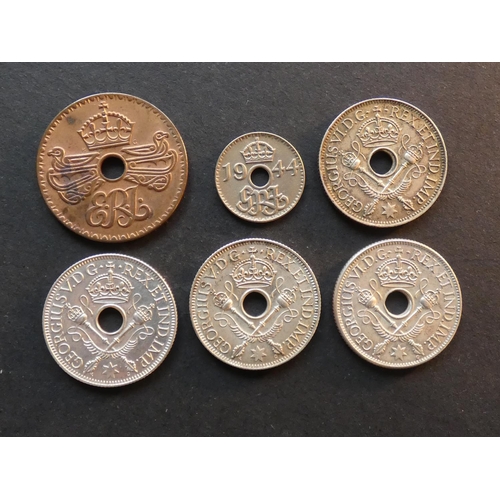 396 - NEW GUINEA.  Penny, 1936 (Edward VIII), plus 3 Pence, 1944 and 4x Shilling; 1935, 1936 (George V), 1... 