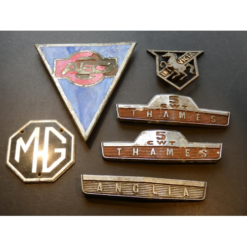 810 - VEHICLE INSIGNIA. Small collection of used lorry insignia & car badges, including 