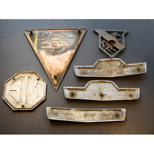 810 - VEHICLE INSIGNIA. Small collection of used lorry insignia & car badges, including 