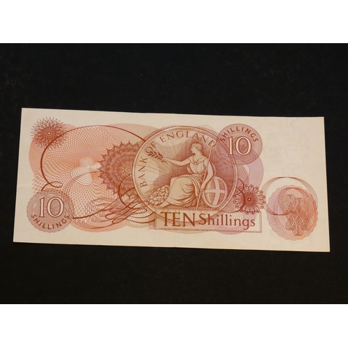 49 - BANK OF ENGLAND. 10 Shillings.  Sign. HOLLOM, Dug.B296 (BE36b), replacement, serial number M31 69995... 