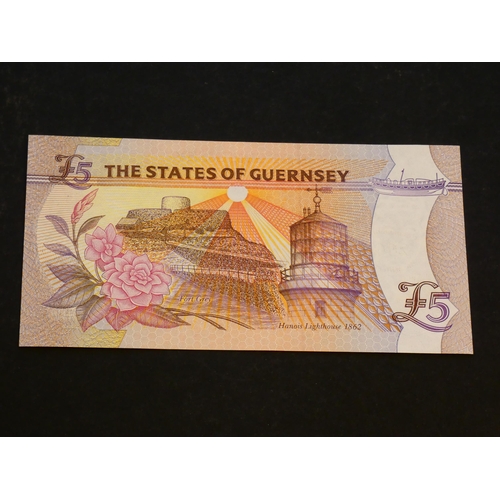 79 - GUERNSEY.  5 Pounds, 2000, millennium commemorative, sign. D.P. TRESTAIN, GU46 (P-60), UNC.