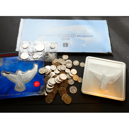 151 - CANADA.  2000, Millennium set of 12x 25 Cent coins & medallion, in display card, slight damage to ca... 