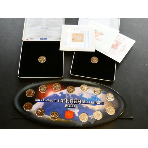 151 - CANADA.  2000, Millennium set of 12x 25 Cent coins & medallion, in display card, slight damage to ca... 