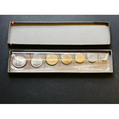 177 - FRANCE.  FDC UNC set, 1964, 1 Centime to silver 5 Francs (7 coins), in original box.  Marks & toning... 