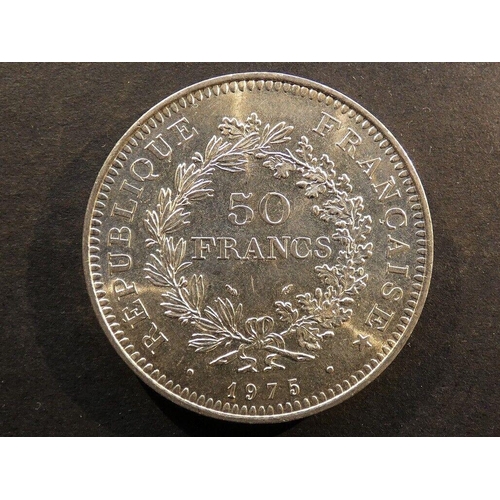35 - COINS - FRANCE.  Fifth Republic (1958-), silver 50 Francs, 1975, KM941.1, AUNC, light toning and con... 