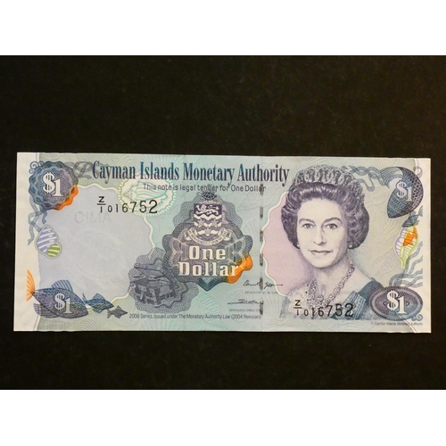 26 - CAYMAN ISLANDS.  1 Dollar, 2006 series, sign. Kenneth Jefferson & Cindy Scotland, replacement, seria... 