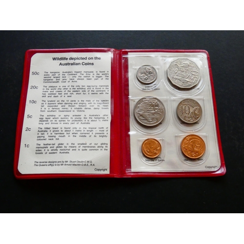 159 - COLLECTION.  Australia, Mint Set, 1983, 1c to 50c in red vinyl wallet, together with Guernsey, 8 Dou... 