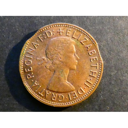 241 - UNITED KINGDOM.  Penny.  1967, S-4157, minting error; 2 small flan clips, EF, trace lustre.