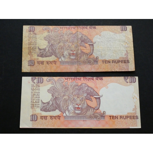 25 - INDIA.  10 Rupees, 2011, P-95y, NF & 2012, P-102e, VF, both ERRORS: misaligned guillotining.  (2)