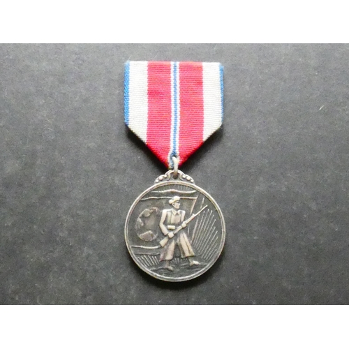 514 - NORTH KOREA.  Military Merit Medal, with ribbon, GVF