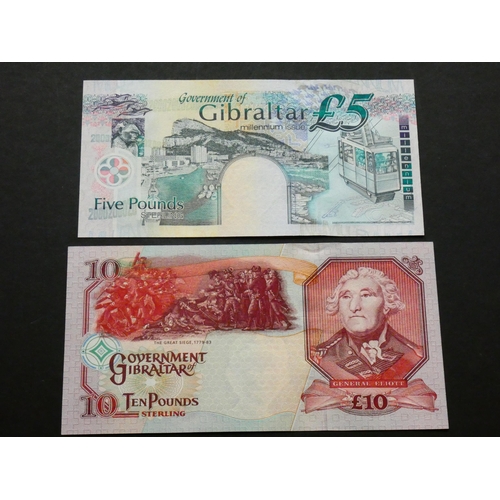 32 - GIBRALTAR.  5 Pounds, 2000 Millennium issue, P-29, and £10, 1.12.2006, P-32a, UNCs, light ATM crease... 