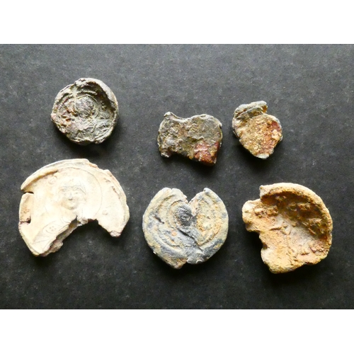 45 - BYZANTINE.  Small group of Byzantine lead seals, various designs, including nimbate bust/inscription... 