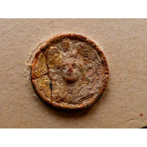 93 - TUNISIA.  Archaic terracotta clay imitation of Greek coin; female head facing, traces of gilding, 21... 