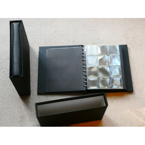 97 - ACCESSORIES.  Two black padded vinyl coin albums, by SAFE, with pages, dividers and slipcases, used ... 