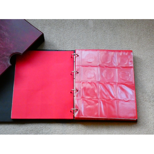 98 - ACCESSORIES.  Red padded vinyl coin album and slipcase, by Bensons, with pages and dividers, used bu... 