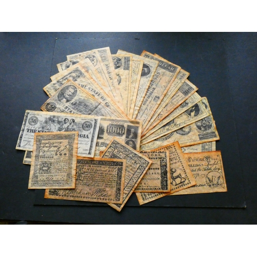 7 - EPHEMERA.  Small collection of reproduction US banknotes, including continental currency issues, etc... 