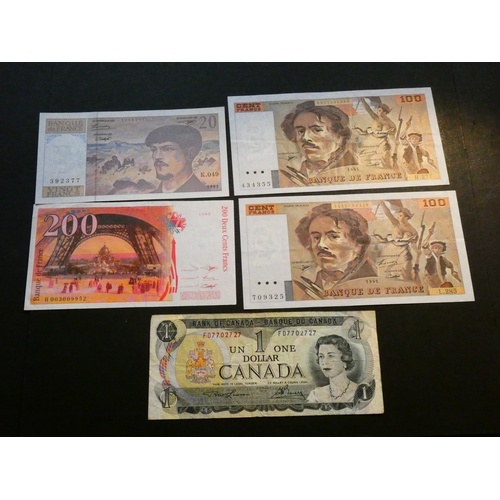 2 - COLLECTION.  WORLD, including Canada, $1, 1973, P-85, together with France; 20 Francs, 1995, P-151h,... 