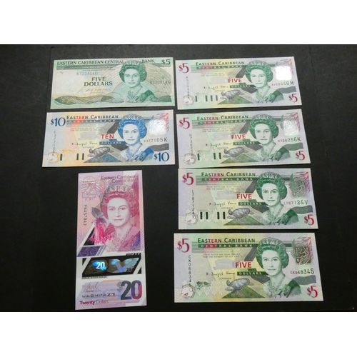 8 - EAST CARIBBEAN STATES.  $5, ND(1988-1993), P-22g1, issue for Grenada, together with $5, ND(2003), P-... 