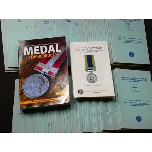 87 - BOOKS.  MEDAL YEARBOOK, Token Publishing, 25th edition, 2019, 8vo, paperback, 544pp, illustrated, to... 