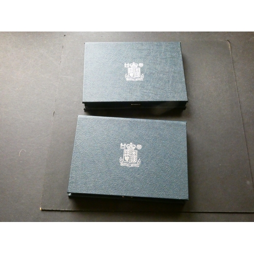 239 - UNITED KINGDOM.  Proof Sets.  1987 and 1988, each 1p to £1, standard issue blue cases.  (2)