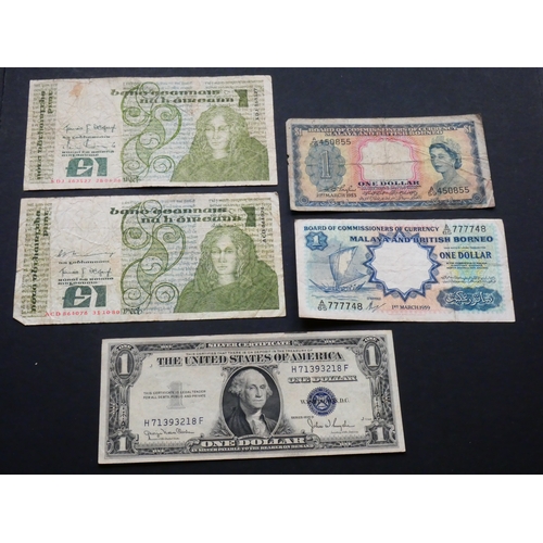 2 - COLLECTION.  World, including Malaya & British Borneo, $1 (21.3.1953, P-1a & 1.3.1959, P-8a), togeth... 