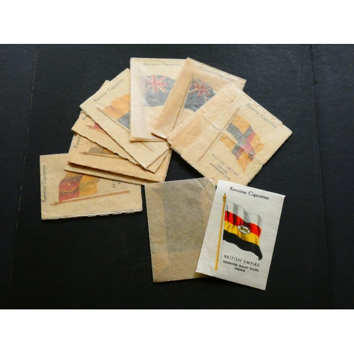 507 - CIGARETTE CARDS.  Small lot of silk cigarette cards (1934) by Kensitas, depicting British Empire nat... 