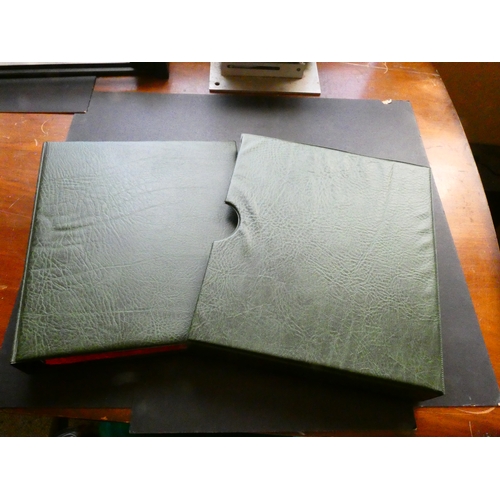 186 - ACCESSORIES.  Green textured vinyl coin album, with pages, dividers, and slipcase.