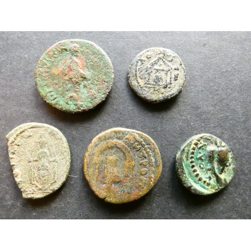 84 - COINS. A small group of Greek Imperial or Roman Provincial bronze types, circa 2nd and 3rd CE. Whils... 