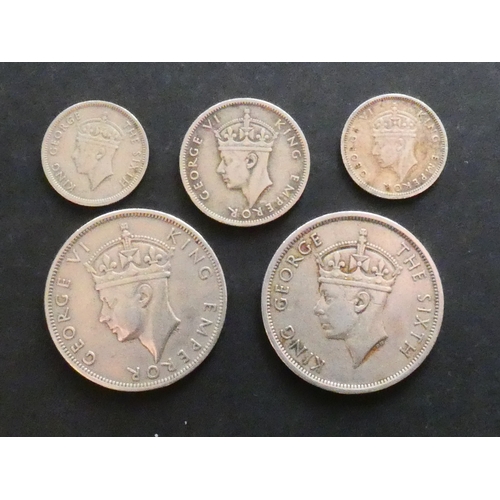 115 - COINS.  Southern Rhodesia, silver Sixpence, 1941, together with copper-nickel Sixpence, 1951, plus c... 