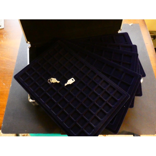 194 - ACCESSORIES.  Aluminium storage/carrying case containing five dark blue plush-lined trays to hold 20... 