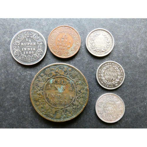 123 - COINS.  India, Victoria (1837-1901), silver ¼ Rupee, 1886, Calcutta mint, together with silver 2 Ann... 