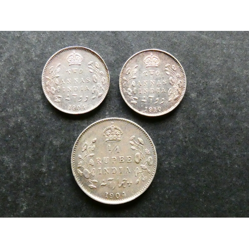 125 - COINS.  India, Edward VII (1901-1910), silver ¼ Rupee, 1904, together with silver 2 Annas, 1904 and ... 