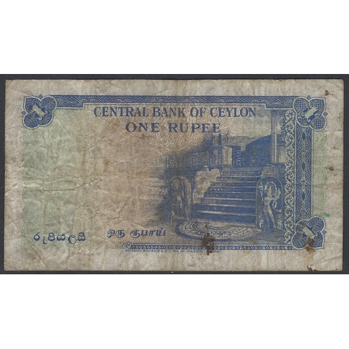 27 - BANKNOTE.  Ceylon, 1 Rupee, 20th January 1951, P-47, prefix A/1, VG