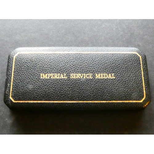 204 - MEDALS & MILITARIA.  United Kingdom, Imperial Service Medal, George VI second issue (1949-1952), obv... 