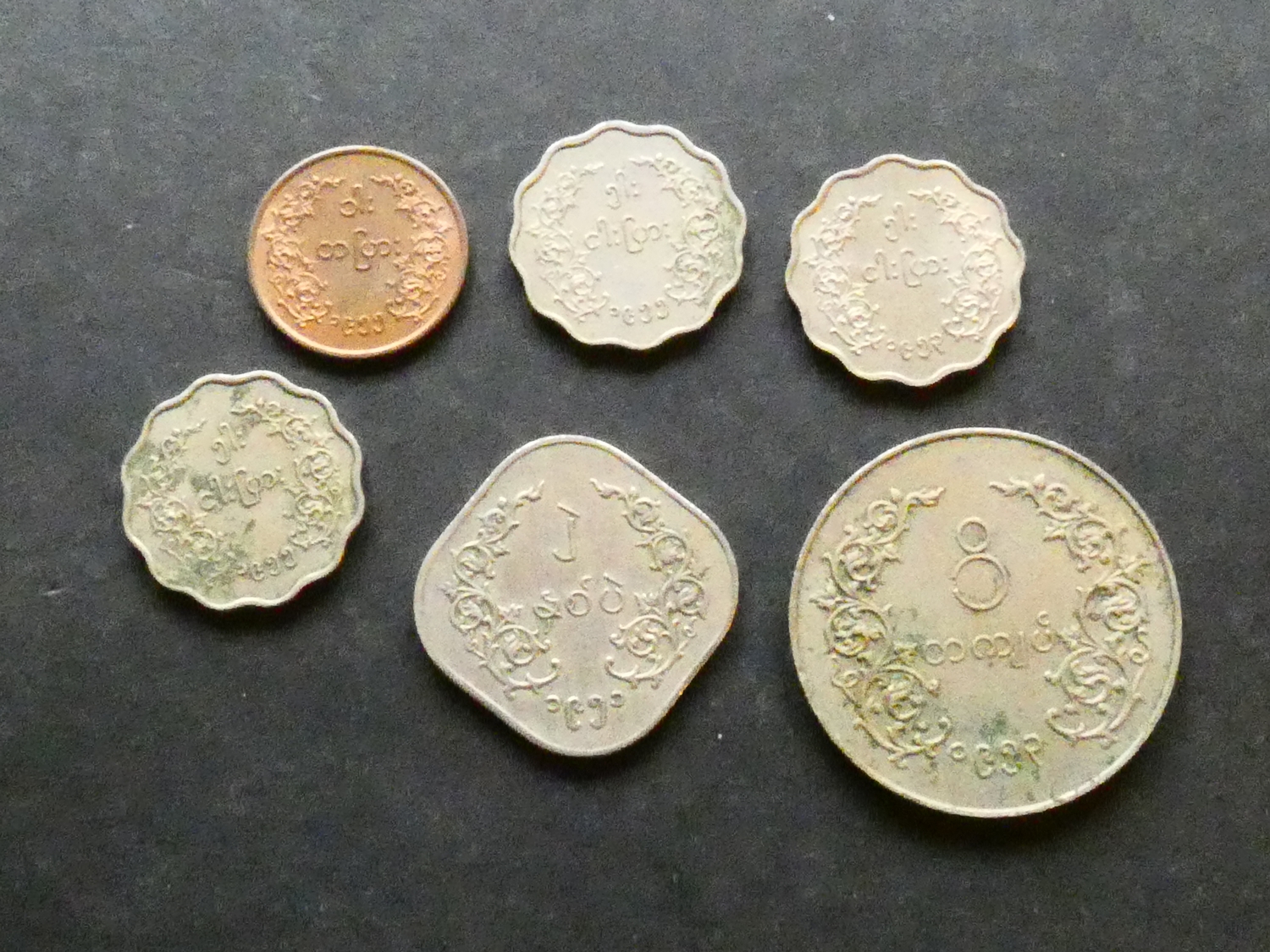 COINS. Burma, bronze Pya (1955), together with copper-nickel 5 Pyas ...