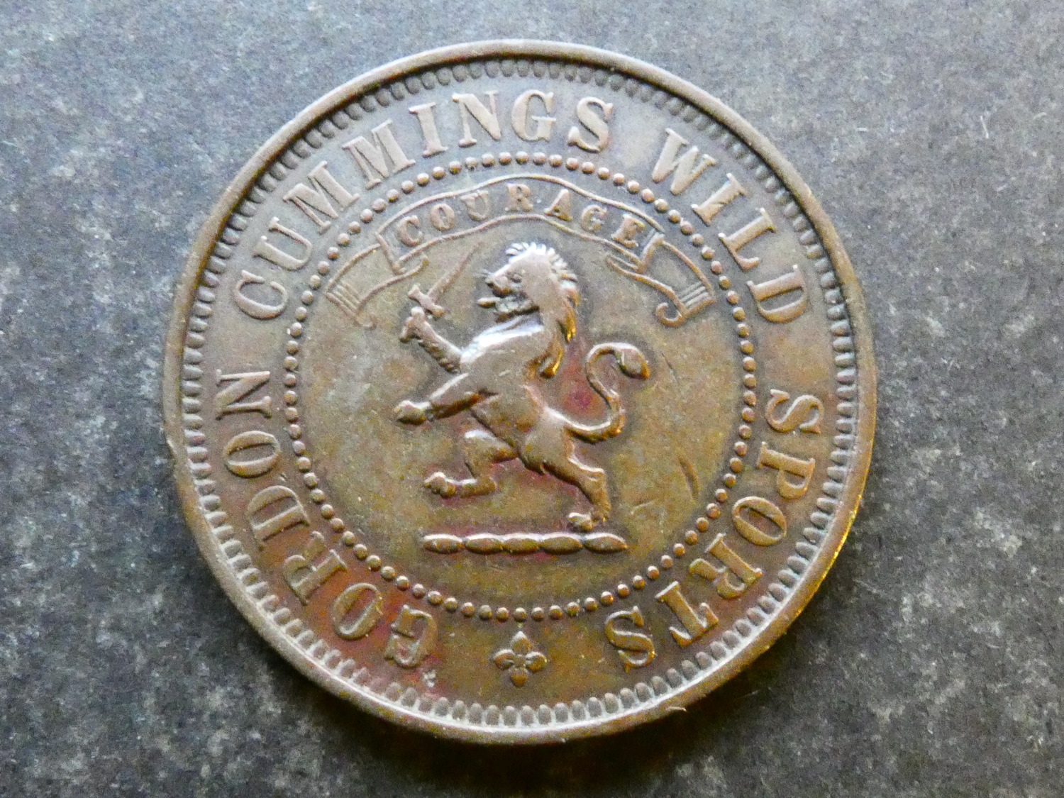 TOKEN. Tickets and passes, circus, obverse; GORDON CUMMINGS WILD SPORTS ...