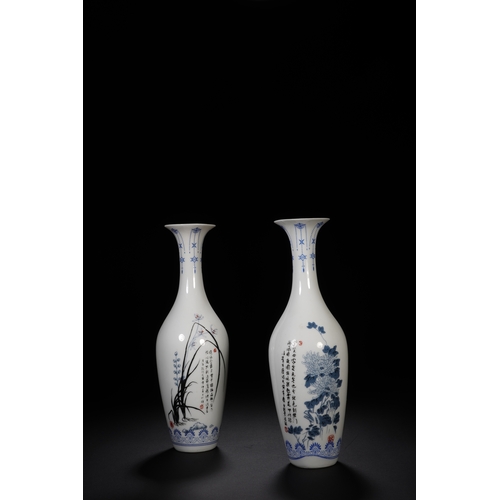 106 - A pair of blue and white with ink colour decorative vase each 19.5cm high, 6cm wide