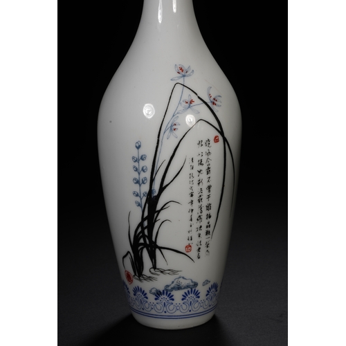 106 - A pair of blue and white with ink colour decorative vase each 19.5cm high, 6cm wide