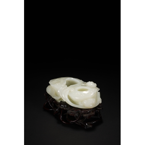 109 - A white jade 'lotus' brush washer, Qing Dynasty 13cm long, 7cm high (with stand), 5.5cm high (withou... 