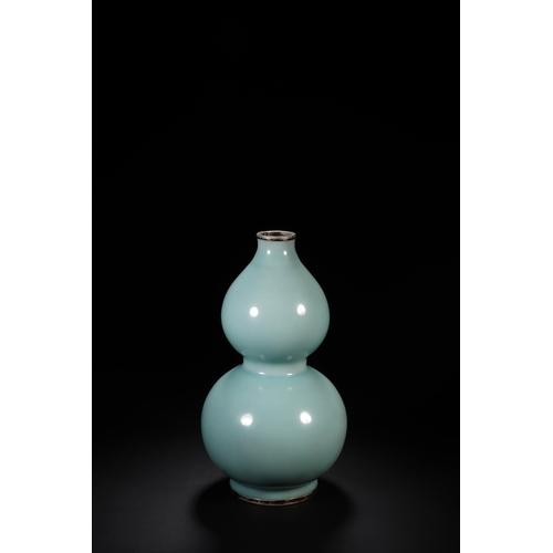 11 - A celadon glazed double gourd vase with imperial poem 23cm high, 12cm wide