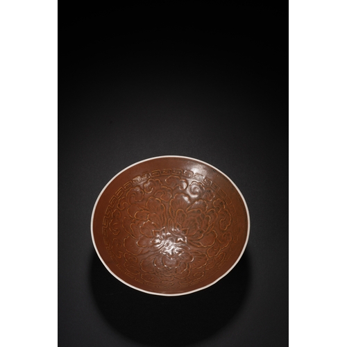 15 - A brown glazed 'floral' conical bowl 14cm diameter, 4cm high