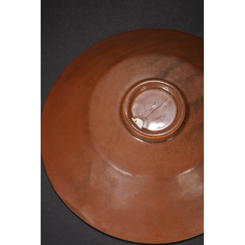 15 - A brown glazed 'floral' conical bowl 14cm diameter, 4cm high