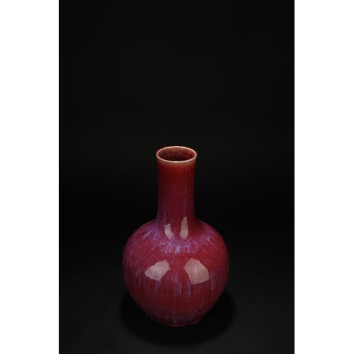 17 - A red glazed globular vase 'tianqiuping' 34cm high