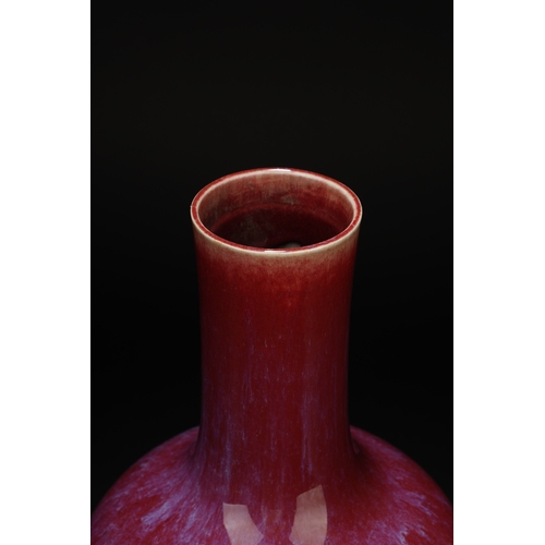 17 - A red glazed globular vase 'tianqiuping' 34cm high