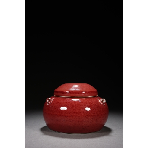 201 - A red-glazed jar with cover 17cm wide, 12cm high