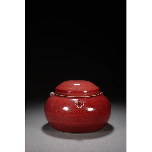 201 - A red-glazed jar with cover 17cm wide, 12cm high