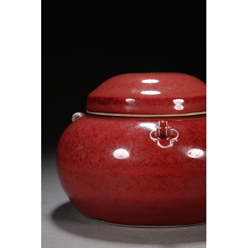 201 - A red-glazed jar with cover 17cm wide, 12cm high